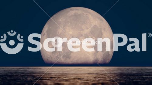 The Moon Rising Over The Sea During The Mid Autumn Festival On August 15th